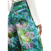 Desigual Damen-Jeans aus hellblauer Baumwolle mit Blumenmuster und lebhaftem Seesternprint in Türkis, Grün, Rosa und Lila, weites Bein