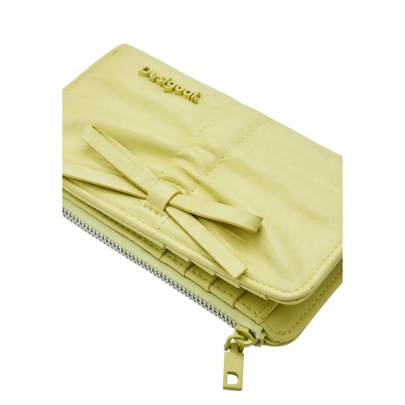 Gelbe Desigual Damen-Geldbörse mit aufgenähter Schleife und silbernen Reißverschlusstaschen, Maße: 16 x 10 x 1,5 cm
