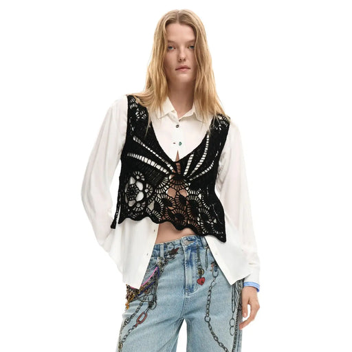 Black lace crochet vest with intricate floral patterns worn over Desigual women white cotton classic button shirt