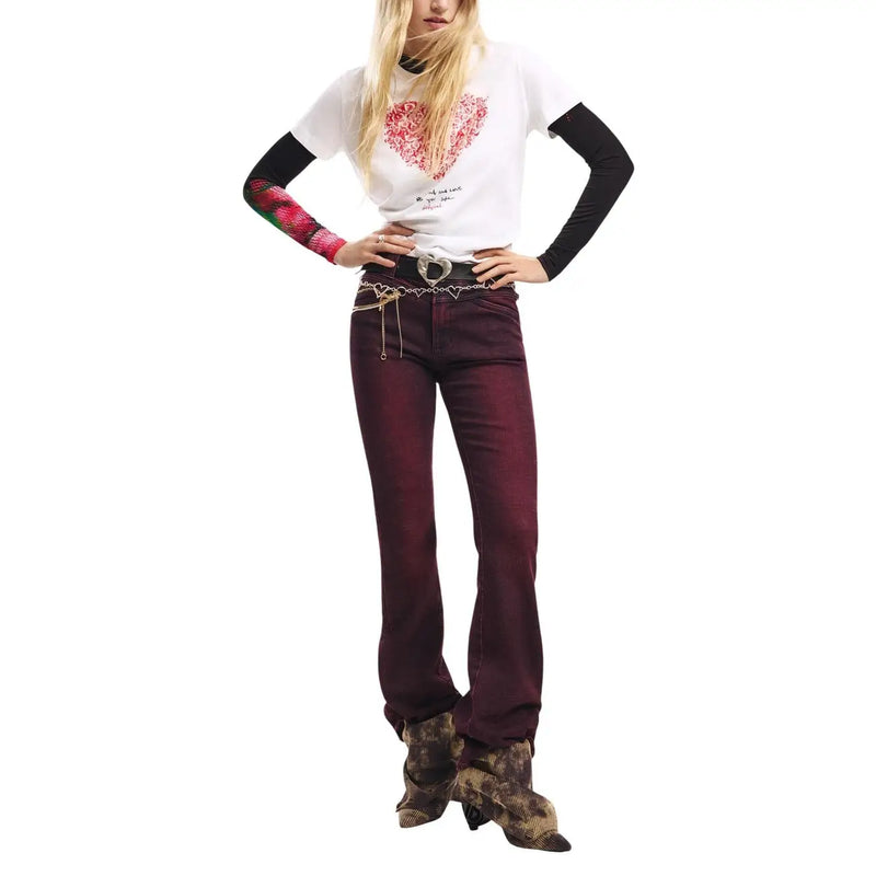 A model wearing a pair of maroon flared jeans with subtle sheen paired with a desigual women white cotton short sleeve t shirt