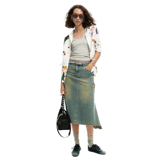 Black studded shoulder bag with sleek minimalist design paired with desigual women white floral long cotton shirt