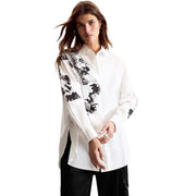 Desigual women white long cotton shirt with bold black abstract leaf patterns on shoulders and sleeves