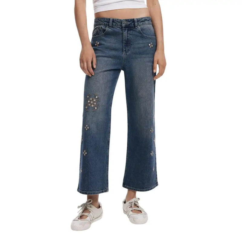 Women’s mid-wash wide-leg denim jeans with floral embellishments and rhinestone details