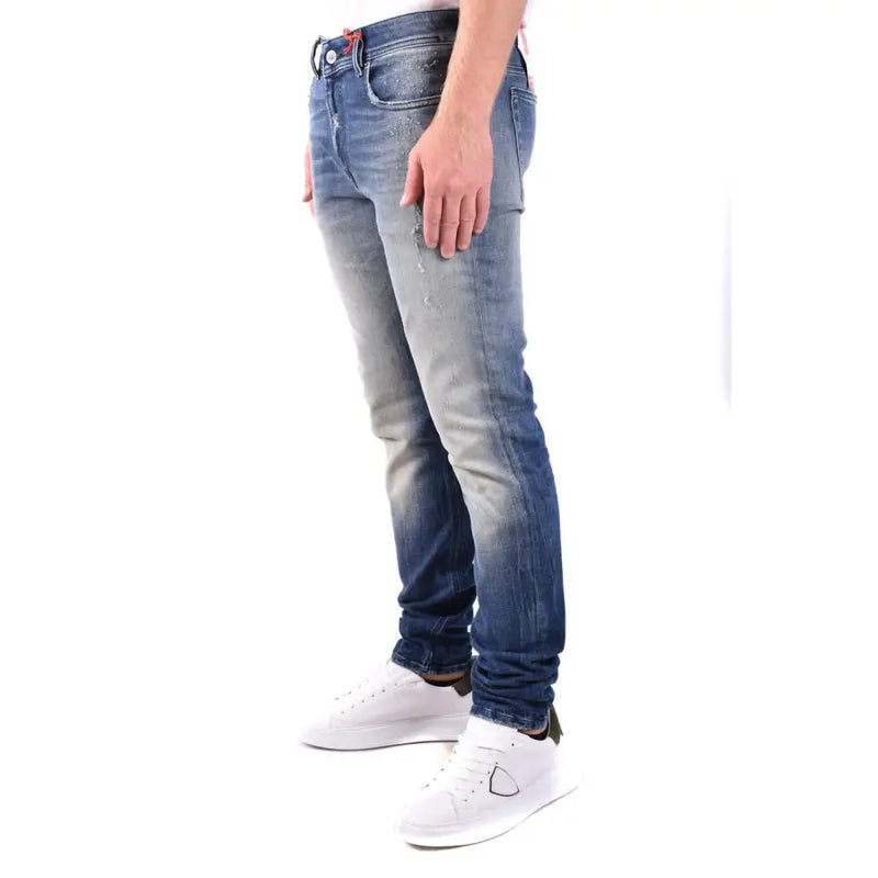 Diesel men blue cotton jeans with worn effect featuring faded distressed wash and subtle whiskering details
