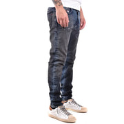 Diesel men jeans in dark blue worn out effect with slim fit and distressed details made of 100 cotton
