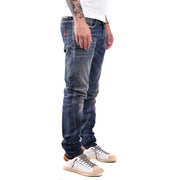 Dark-wash denim slim fit Diesel men jeans in cotton elastane with subtle fading and red logo on back pocket