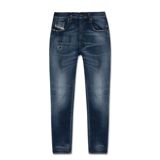 Diesel men jeans in dark blue cotton lyocell with a worn out effect featuring distressed and subtle fading details
