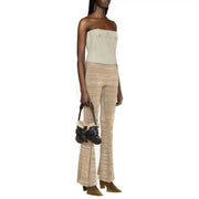 Schwarze Mini-Ledertasche mit Shearling-Futter und Schnallendetails, kombiniert mit Diesel Damen hellblaue Baumwolle top