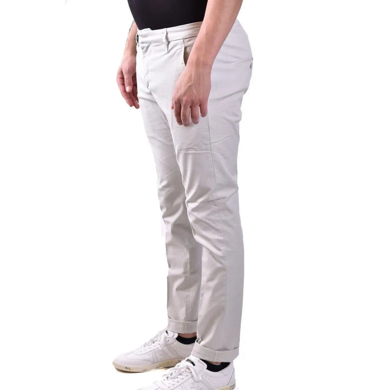 Dondup men grey cotton trousers featuring a slim fit light beige chino style with rolled cuffs