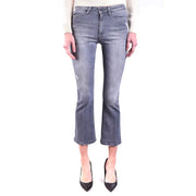 Women’s faded gray flared jeans with distressed details from Dondup for spring summer fashion