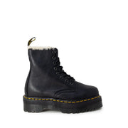 Dr Martens black leather ankle boots for women shown from the back side featuring durable leather material