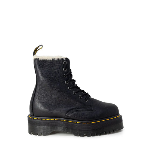 Dr Martens black leather ankle boots for women shown from the back side featuring durable leather material