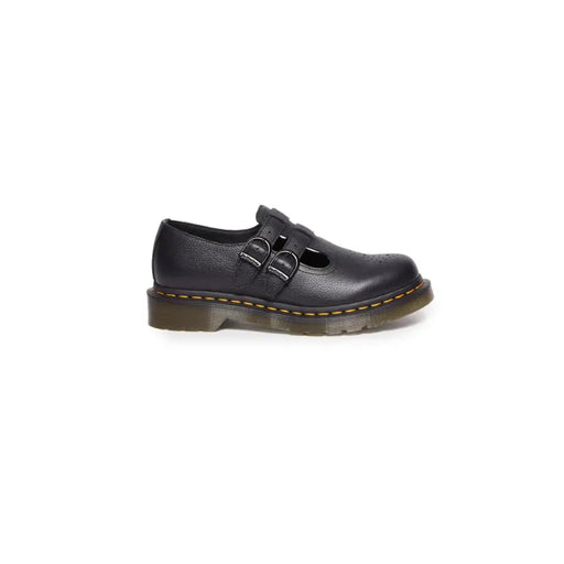 Black leather slip on shoes by dr martens size 3 showing back side detailing and stitching