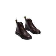 Dunkelbraune Dr. Martens Brookline Chukka-Stiefel für Herren aus Leder, die die Rückseite des Schuhwerks zeigen
