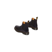 Schwarze Dr. Martens Herren-Ankle-Boots aus Leder mit elastischen Seiteneinsätzen und gelben Ziernähten im Chelsea-Stil