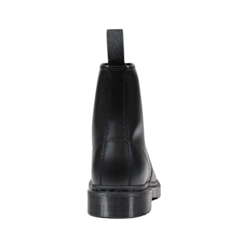 Schwarze Dr. Martens Herren-Schnürstiefel aus Leder, die die Rückseite mit strapazierfähiger Sohle und gelben Nähten zeigen.