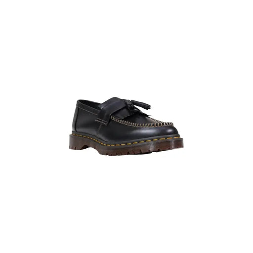 Dr. Martens Herren-Ledermokassin, schwarz, zum Hineinschlüpfen, mit Quasten, gelben Ziernähten und dicker brauner Sohle