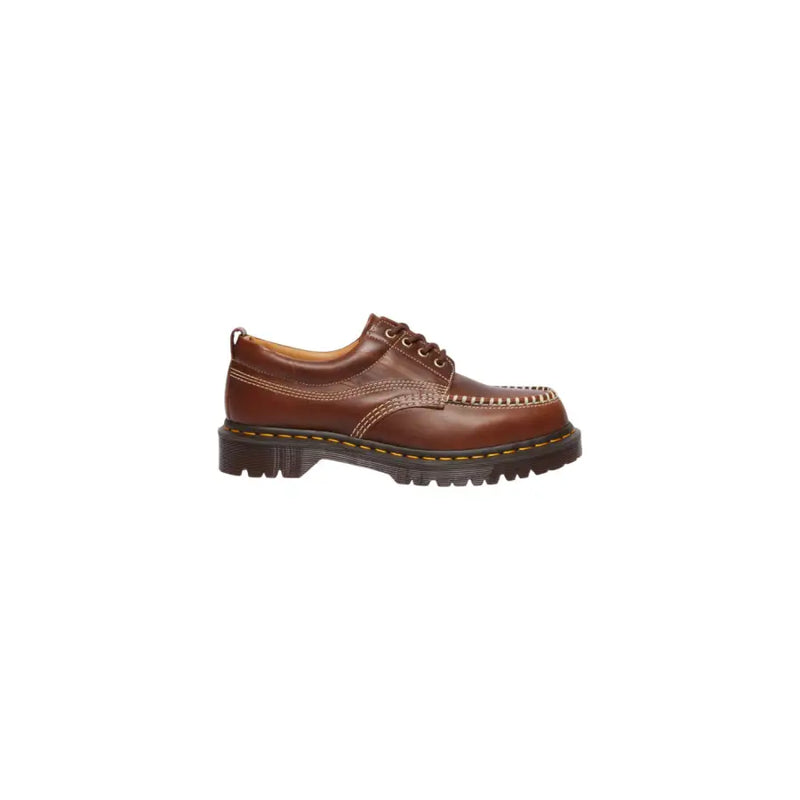 Braune Dr. Martens Herren-Schnürschuhe Lowell in Butterscotch aus Leder mit detaillierter Textur und Nähten
