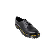 Dr Martens men’s black leather lace-up shoes showing the back side of the footwear