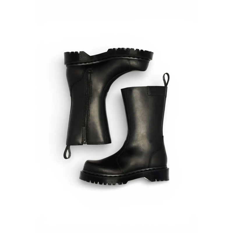 Dr Martens women black leather ankle boots with chunky sole and side zipper for durable stylish wear