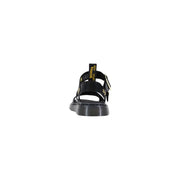 Black leather buckle sandals for women by dr martens shown from the back side