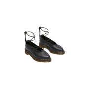 Dr Martens women black leather slip on mary jane shoes with lace up ankle straps and yellow stitched sole