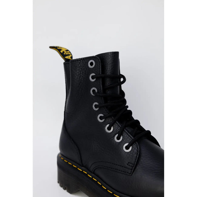 Black leather dr martens women boots with black laces size 4 shown from the back side