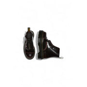 Dark burgundy leather platform boots by dr martens for women shown from the back side