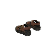 Brown leather sandals with black rubber soles and gold-tone buckles dr martens women zebzag style