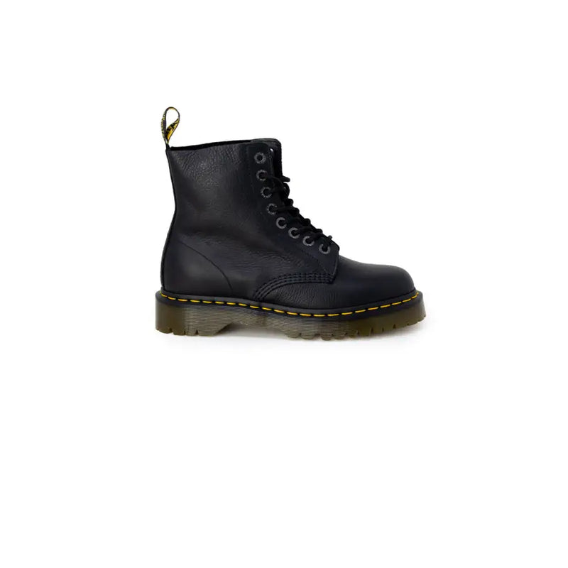 Black leather ankle boots for women by dr martens shown from the back side displaying sturdy sole and pull tab