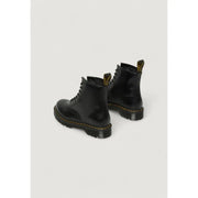 Dr Martens women’s black leather ankle boots shown from the back side, ideal for fall and winter wear
