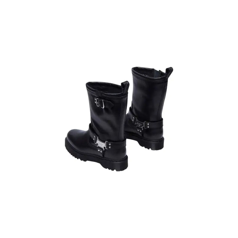 Dr martens women’s black leather motorcycle ankle boots with silver buckle accents and chunky rubber sole
