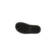 Black rubber sole with textured tread and small rectangular logo near the heel of dr martens women’s black leather ankle boots