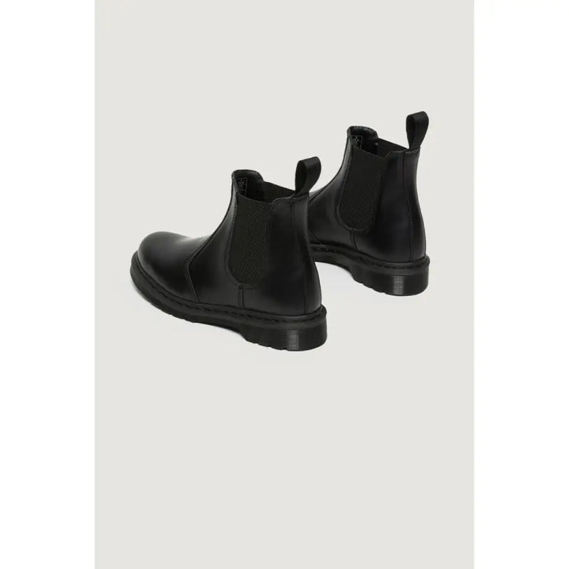 Dr. Martens womens black leather Chelsea boots with elastic panels and chunky rubber sole
