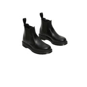 Dr Martens women’s black leather chelsea boots with elastic side panels and chunky rubber sole for fall winter