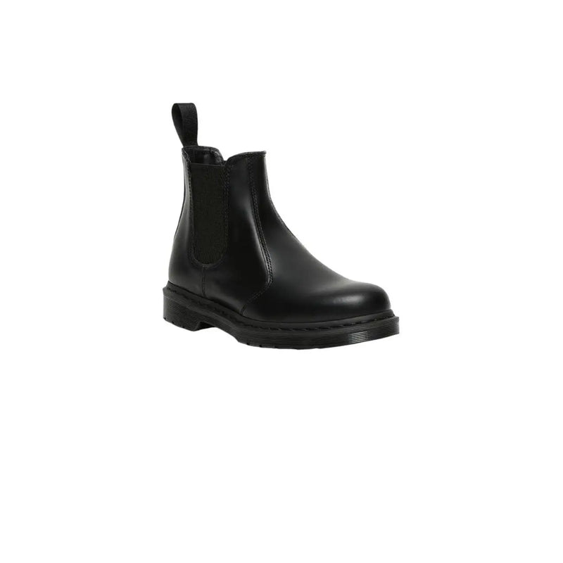 Dr Martens women’s black leather chelsea boot with pull tab and chunky rubber sole shown from back side