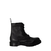Black leather dr martens women’s boots shown from the back side highlighting their durable leather material