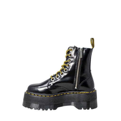 Dr Martens women’s black patent leather lace-up boots showing the back side of the footwear