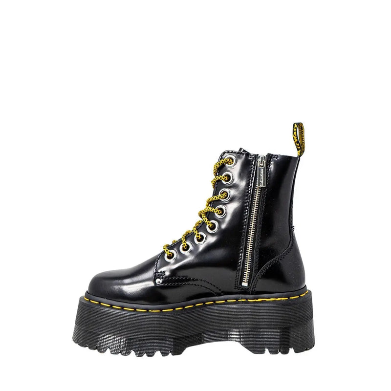 Dr Martens women’s black patent leather lace-up boots showing the back side of the footwear