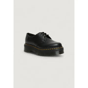 Dr martens women’s black leather lace up shoes shown from the back side with smooth leather finish