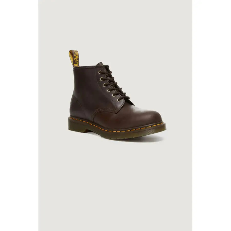 Brown Dr. Martens boots enhancing urban city style and fashion