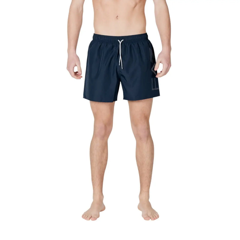 Navy blue EA7 men polyester swim trunks with white drawstring and subtle geometric logo on the side