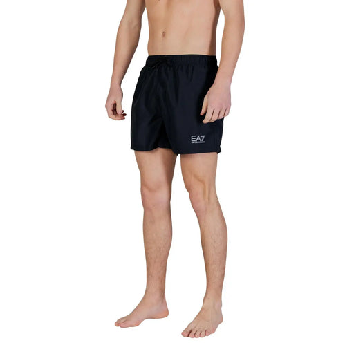 Black ea7 men swimwear polyester swim trunks with pockets and a white logo on the left leg