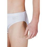 Ea7 men swimwear white plain polyester swim trunks with subtle logo on waistband shown from the front side