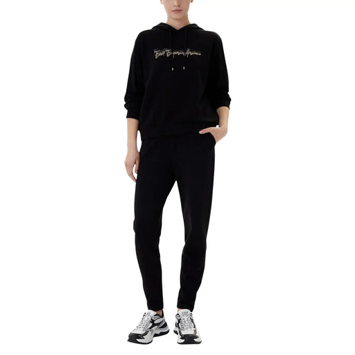 Ea7 women’s black hooded jumpsuit with pockets featuring a black kenzo hoodie and silver embroidered logo with matching joggers
