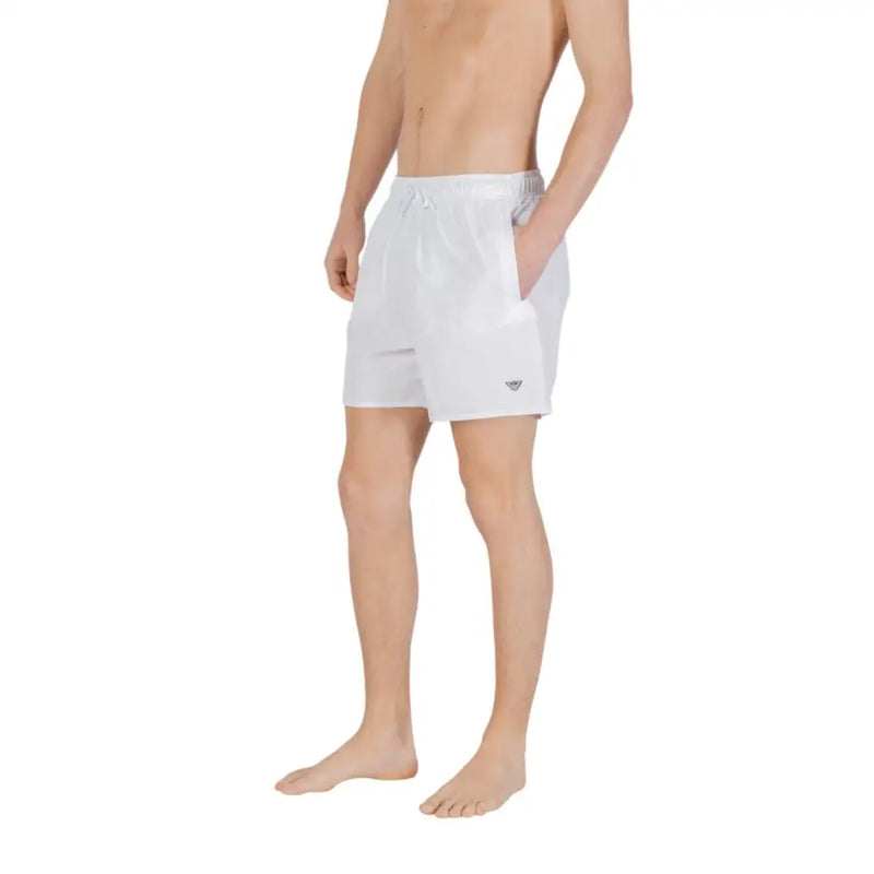 White men’s swim trunks by Emporio Armani with a drawstring waistband and logo on the lower left leg