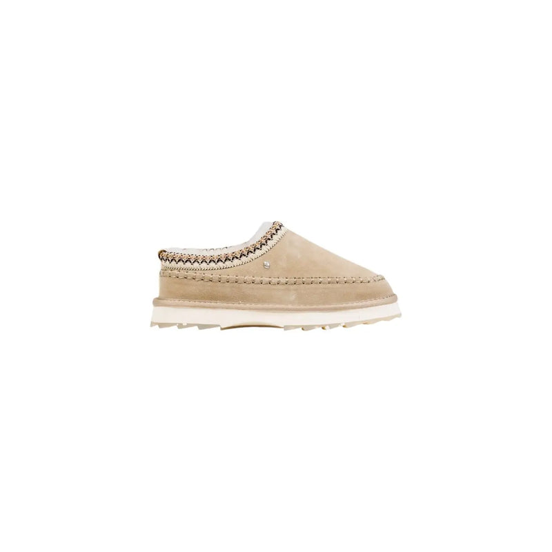 Beige suede slip-on moccasin with white rubber sole and decorative stitching from Emu Australia women leather slippers