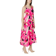 Fuchsia floral v-neck maxi dress with thin straps black and cream accents and a tiered skirt for elegant occasions
