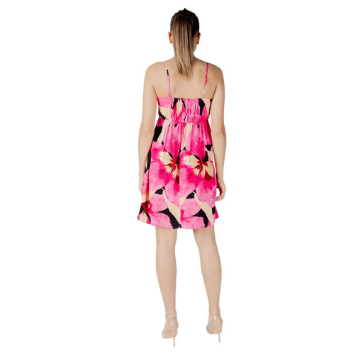 A vibrant fuchsia floral v-neck dress with thin straps and a gathered waist perfect for summer occasions