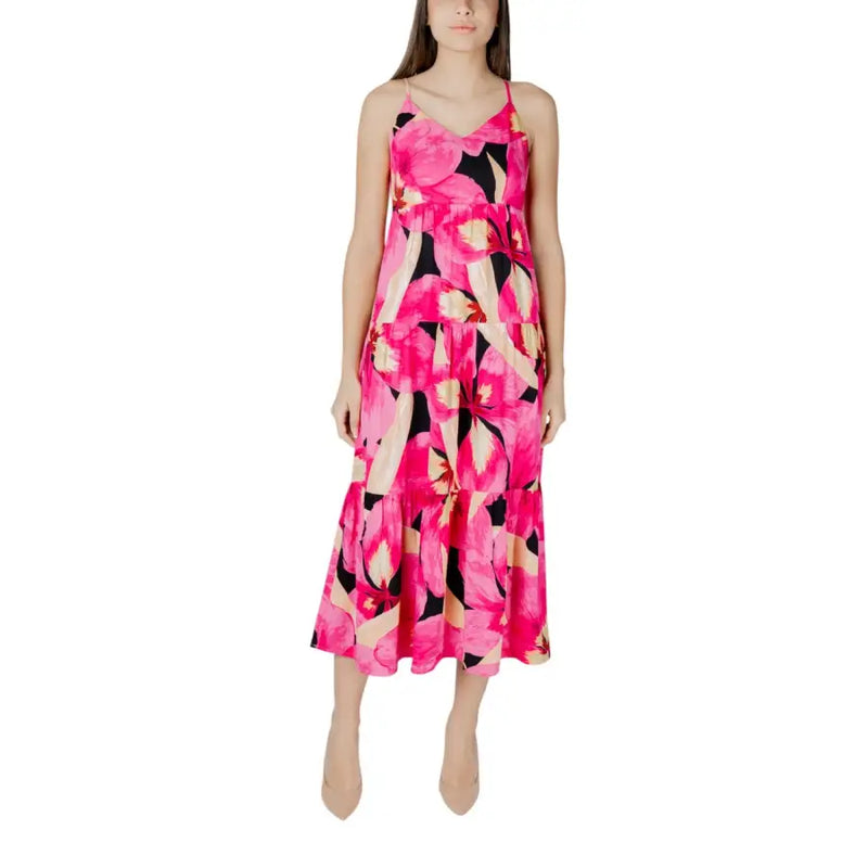 Fuchsia floral v-neck maxi dress with thin straps and tiered skirt featuring pink, black, and beige accents